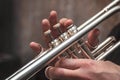 Hand of the Trumpeter on the buttons of trumpet Royalty Free Stock Photo