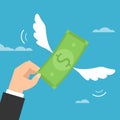 Hand trying to catch flying money. Royalty Free Stock Photo