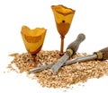 Hand-turned wooden goblets decorated with sawdust and tool