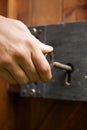 Hand Turning Key In Old Fashioned Lock Royalty Free Stock Photo