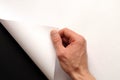 Hand turning paper Royalty Free Stock Photo