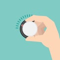 Hand turns Climate control temperature regulator or khob. Royalty Free Stock Photo