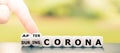 Hand turns dice and changes the expression `during Corona` to `after Corona`. Royalty Free Stock Photo