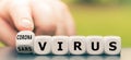 Hand turns a dice and changes the expression `sars virus` to `corona virus`. Royalty Free Stock Photo