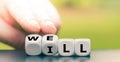 Hand turns a dice and changes the word `ill` to `well`. Royalty Free Stock Photo