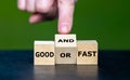 Hand turns wooden cube and changes the expression 'good or fast' to 'good and fast