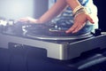 Hand, turntable and music for club performance as dj at techno rave for streaming audio track, hiphop or entertainment