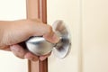 Hand twist handle the door to open. Royalty Free Stock Photo