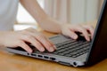 hand typing with laptop. focus on his finger Royalty Free Stock Photo