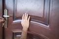 Hand unlocking the door with key Royalty Free Stock Photo