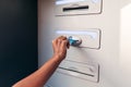 Unrecognizable afro woman inserting credit card on an ATM Royalty Free Stock Photo