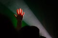 Hand up light beam, crowd people. Royalty Free Stock Photo