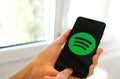 Spotify music app symbol hand smartphone