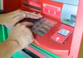 Hand using atm machine Royalty Free Stock Photo