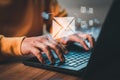 Hand using computer laptop and sending online message with email icon, email marketing concept. Royalty Free Stock Photo