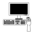 Hand using desk computer with mouse monitor and keyboard in black and white Royalty Free Stock Photo