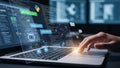 Hand using laptop with AI interface and code on virtual screen Royalty Free Stock Photo