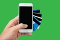 Hand using mobile phone credit card, Online Shopping Concept isolated green Royalty Free Stock Photo