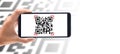 Hand using mobile smart phone scan Qr code on banner background. Barcode reader, Qr code payment, Cashless technology