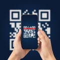 Hand using mobile smart phone scan Qr code. Barcode reader, Qr code payment, Cashless technology, Digital money concept. Royalty Free Stock Photo