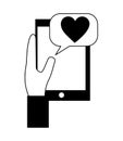 Hand using smartphone with heart and speech bubble Royalty Free Stock Photo