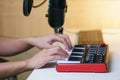 Hand using sound mixing console board. Equipment for the music studio Royalty Free Stock Photo