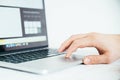 Hand using touchpad on laptop Royalty Free Stock Photo