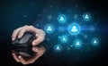 Hand using mouse with human networking concept Royalty Free Stock Photo