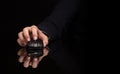 Hand using mouse on dark background Royalty Free Stock Photo