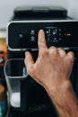 A Hand with Vitiligo Using The Coffee Machine Royalty Free Stock Photo