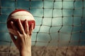 Hand with volleyball over the net. Generate Ai Royalty Free Stock Photo