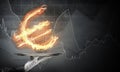 Hand of waitress presenting flaming euro sign. Royalty Free Stock Photo