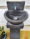 hand wash basin made of black natural stone Royalty Free Stock Photo