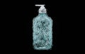 Hand wash dispenser bottle mockup made from soap bubbles isolated on black background. Royalty Free Stock Photo