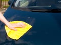 The hand washes a rag the car Royalty Free Stock Photo