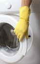 Hand and washing machine. Royalty Free Stock Photo
