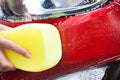 Hand Washing Red Car With Yellow Sponge Royalty Free Stock Photo