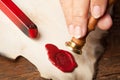 Hand with wax seal Royalty Free Stock Photo