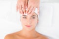 Hand waxing beautiful womans eyebrow Royalty Free Stock Photo