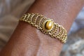 Brass wire bracelet with tiger eye mineral stone Royalty Free Stock Photo