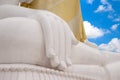 The hand of the white Buddha sky blue background. Royalty Free Stock Photo