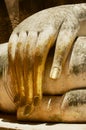 Hand of the White Buddha statue in Wat Sri Chum temple in Sukhothai Historical park in Sukhothai, Thailand.. Royalty Free Stock Photo