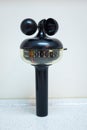 Hand wind meter or anemometer with scale in Beaufort, knots and meter per second. Royalty Free Stock Photo