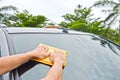 Hand wipe cleaning car glass