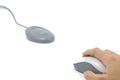 Hand on wireless mouse and receiver Royalty Free Stock Photo