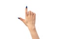 Hand of a woman with blue nails isolated on a white background