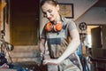 hand of woman carpenter with wood planer Royalty Free Stock Photo