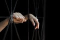 Hand of woman holding cage, abuse, human trafficking concept