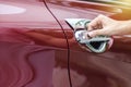 Close up image of a women opens car`s door. Royalty Free Stock Photo