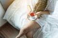 Hand woman holding the coffee mug or tea cup after wake up in morning Royalty Free Stock Photo